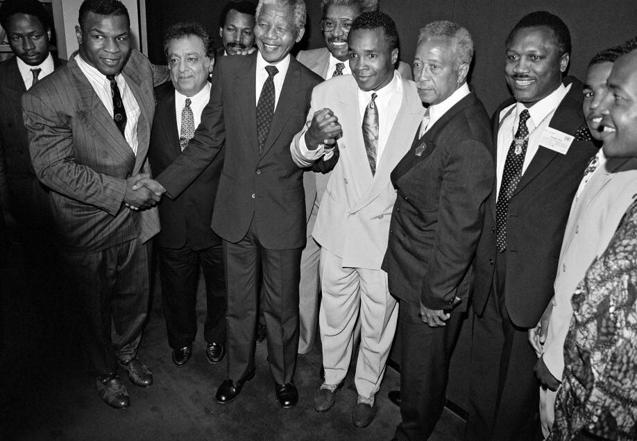 Nelson Mandela meets the United States Boxers. Source: UN Photo / Milton Grant